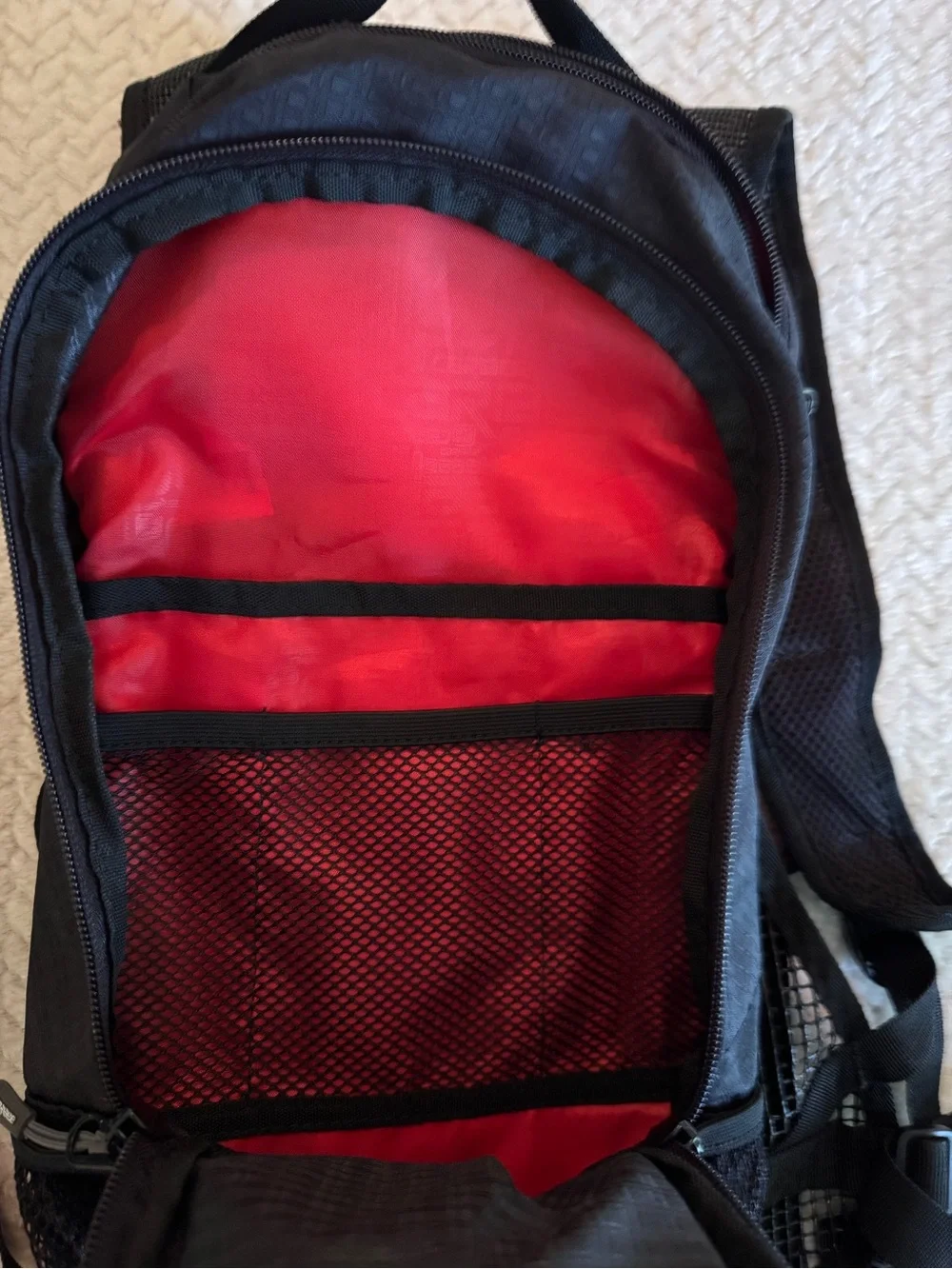 Caribee Skycrane 2L Hiking Daypack Hydration Compatible Black/Red